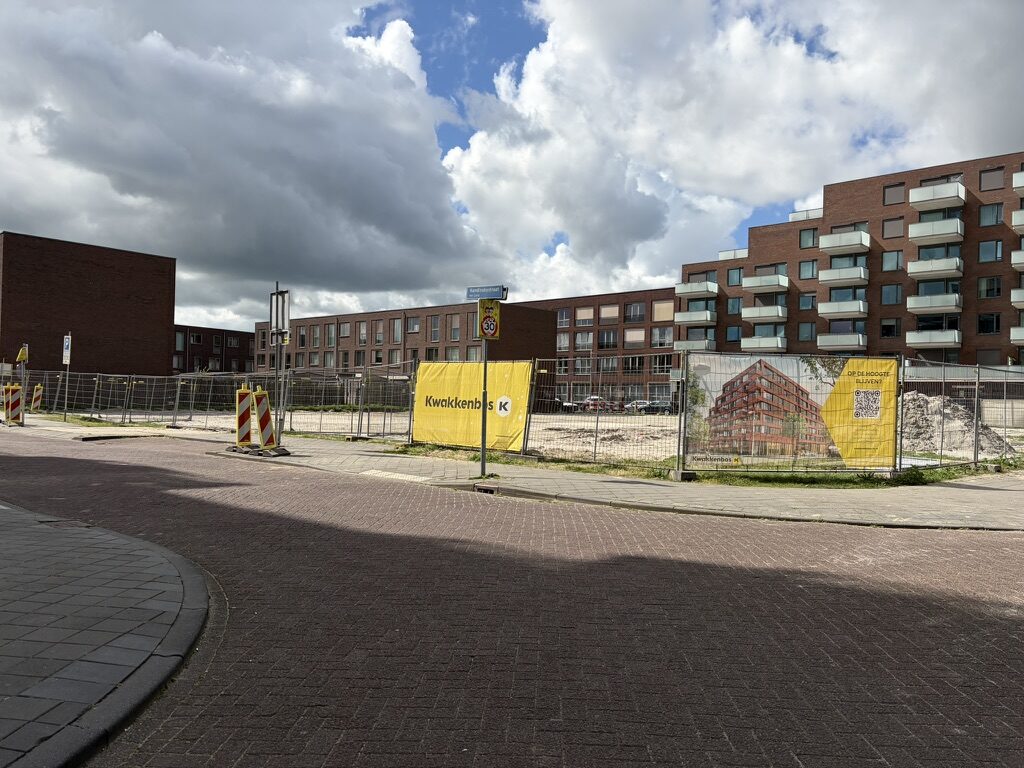 Street view with Kwakkenbos banner along the fence
